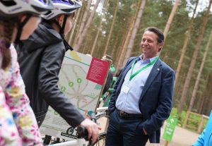 Commonwealth Games Minister Nigel Huddleston chats to children at the launch of the Birmingham 2022 legacy cycling facilities at Cannock Chase Forest New cycling facilities open at Cannock Chase Forest ahead of Birmingham 2022 Commonwealth Games