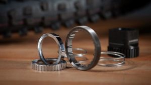 DT Swiss parts layed out on table DT Swiss launch Degrees of Freedom anti-pedal kickback system