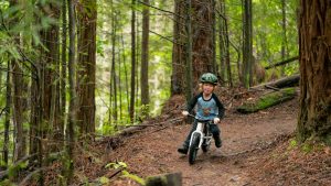 KRS Dirt Hero riding Brook 1 Kids Ride Shotgun launch off-road balance bike with optional Magura MT4 rear brake