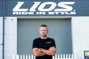 Lios founder in front of sign Lios Bikes founder Steve McCulley talks 'administration as a business model in cycling'