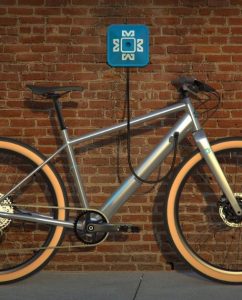 Morelle silver on charge against wall Morelle shares update on its '15 minute charging e-bike' development journey