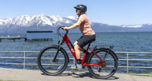 Reid Quest E-Bike, woman on bike with mountains in the background